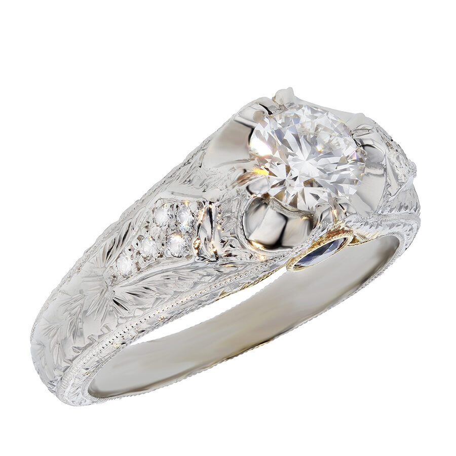 Round Diamond in Platinum Engraved Ring
