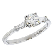 Round Diamond with Baguettes in White Gold Ring