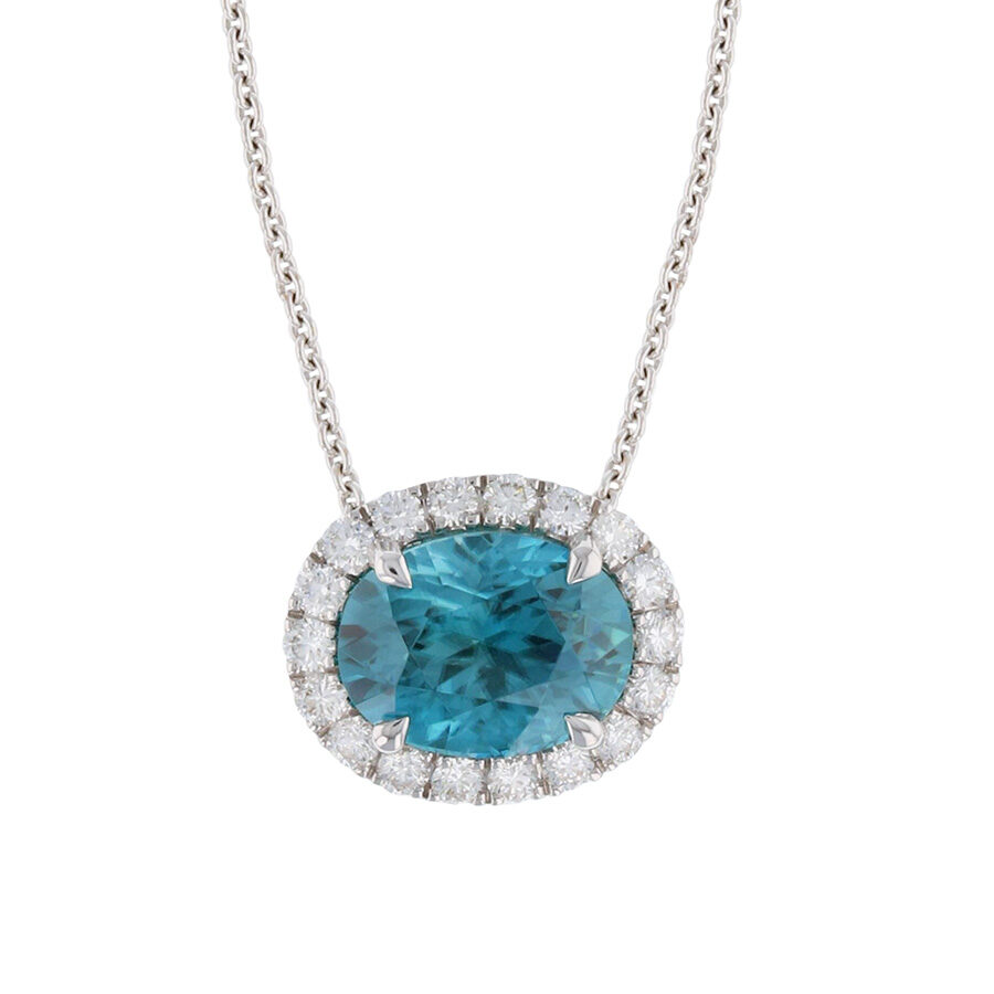 Oval Blue Zircon in White Gold Halo Necklace