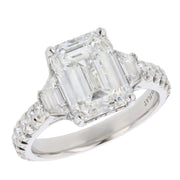Emerald Cut Diamond with Trapezoids in Platinum Ring