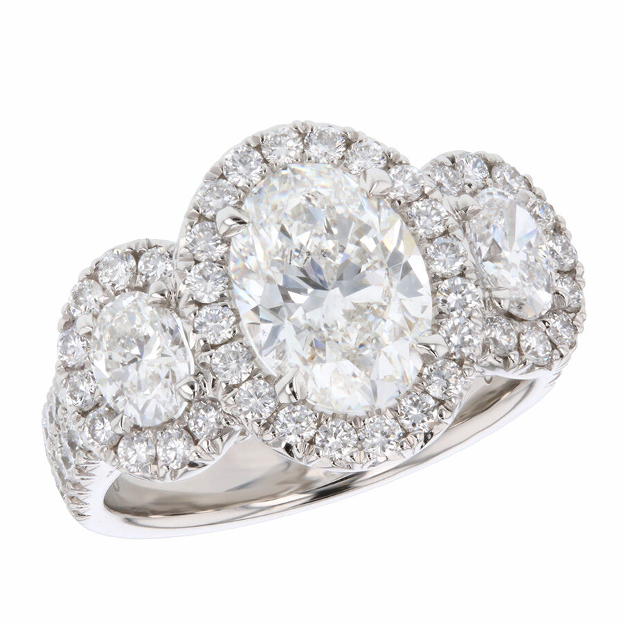 Three Oval Diamonds in Platinum Halo Ring
