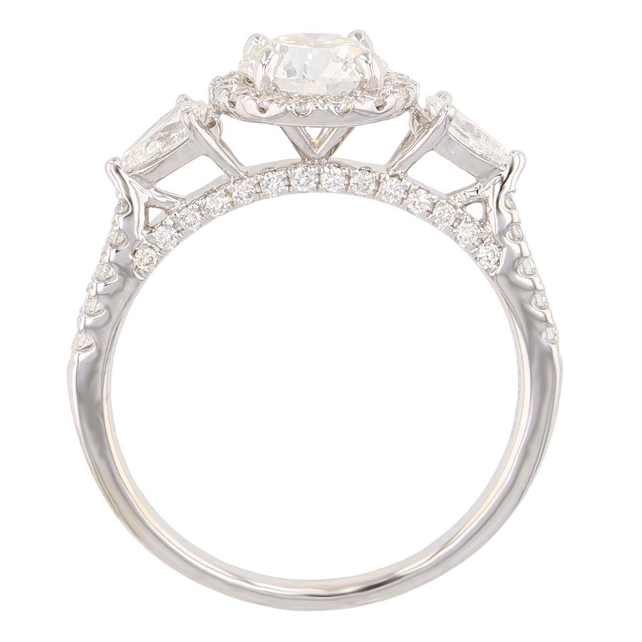 Round Diamond with Pear Shaped Diamonds in White Gold Halo Ring
