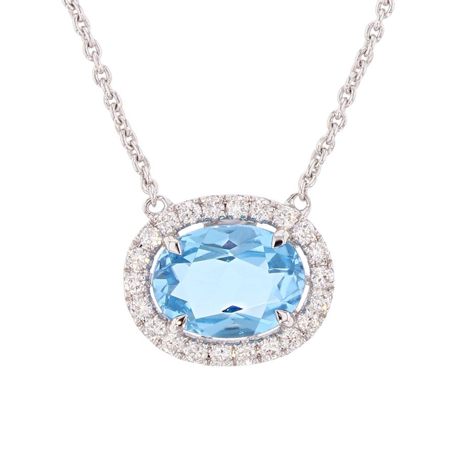 Oval Blue Topaz in White Gold Halo Necklace