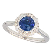 Bezel Set Round Sapphire in White Gold Halo Ring.