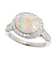 Oval Opal in White Gold Diamond Halo Ring