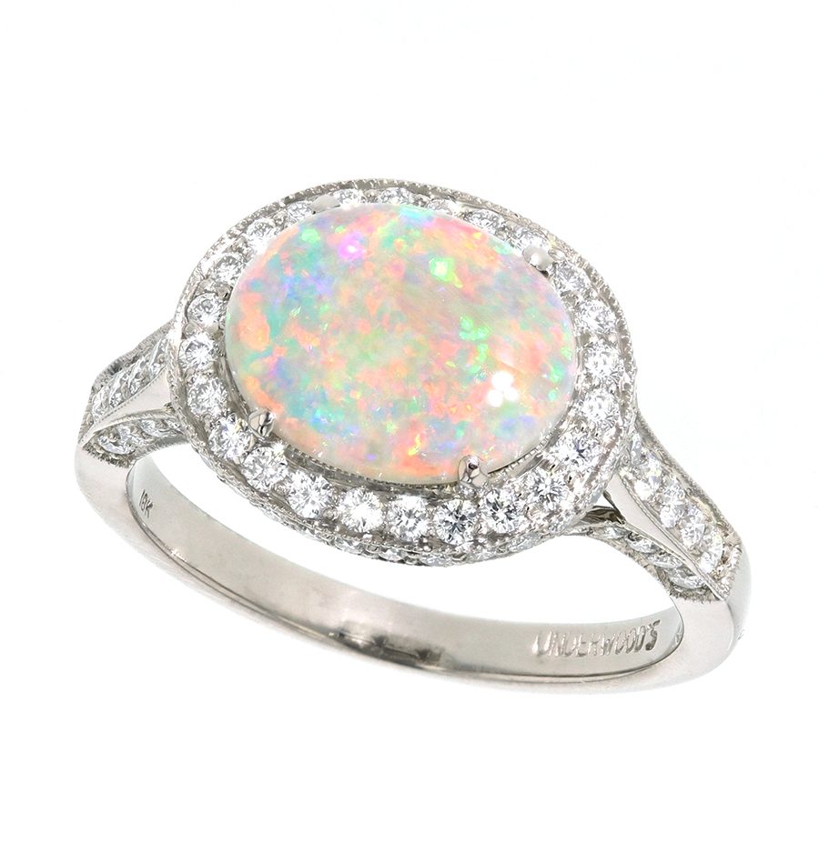 Oval Opal in White Gold Diamond Halo Ring