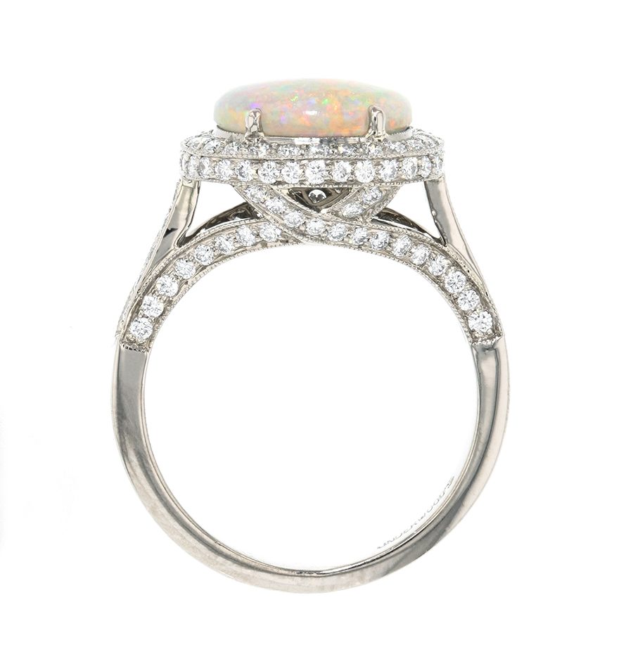 Oval Opal in White Gold Diamond Halo Ring