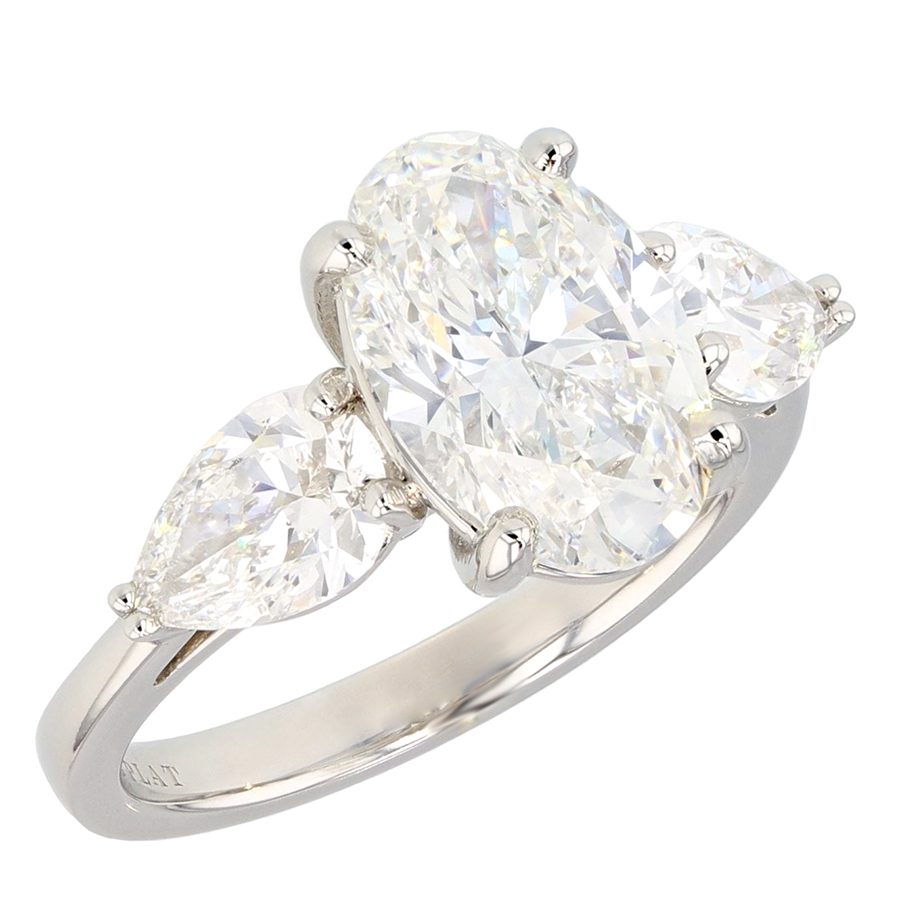 Oval with Pear Shaped diamonds in Platinum Ring