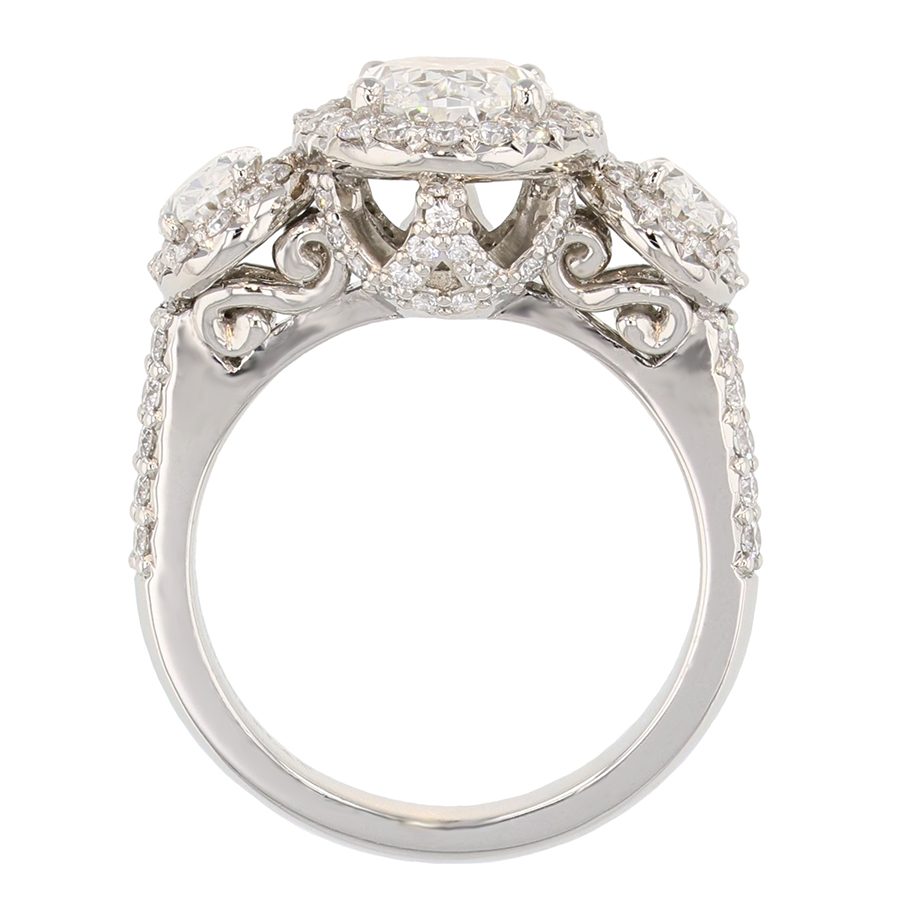 Three Oval Diamonds in Platinum Halo Ring