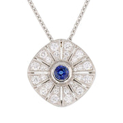 Round Blue Sapphire with Diamonds in Platinum Pendant