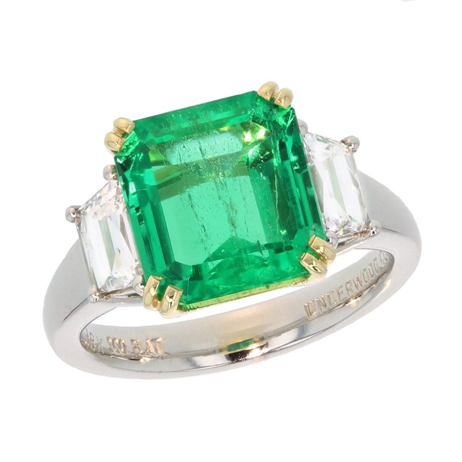 Square Emerald with Trapezoid Diamonds in Platinum Ring