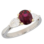 Oval Ruby with Pear Shaped Diamonds in Platinum Ring