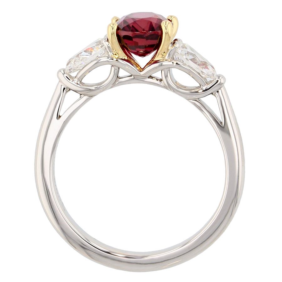 Oval Ruby with Pear Shaped Diamonds in Platinum Ring
