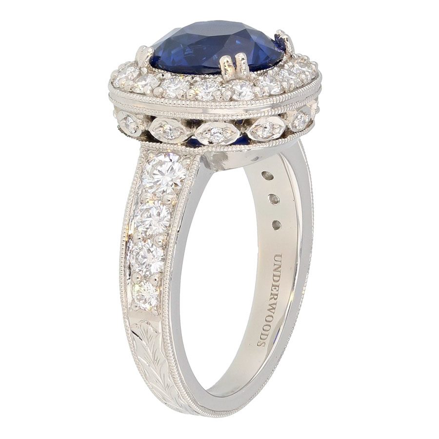 Round Blue Sapphire in Engraved Platinum Halo Ring