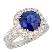 Round Blue Sapphire in Engraved Platinum Halo Ring
